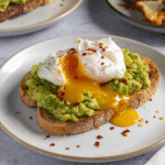 Avocado toast with scrambled egg recipe card image