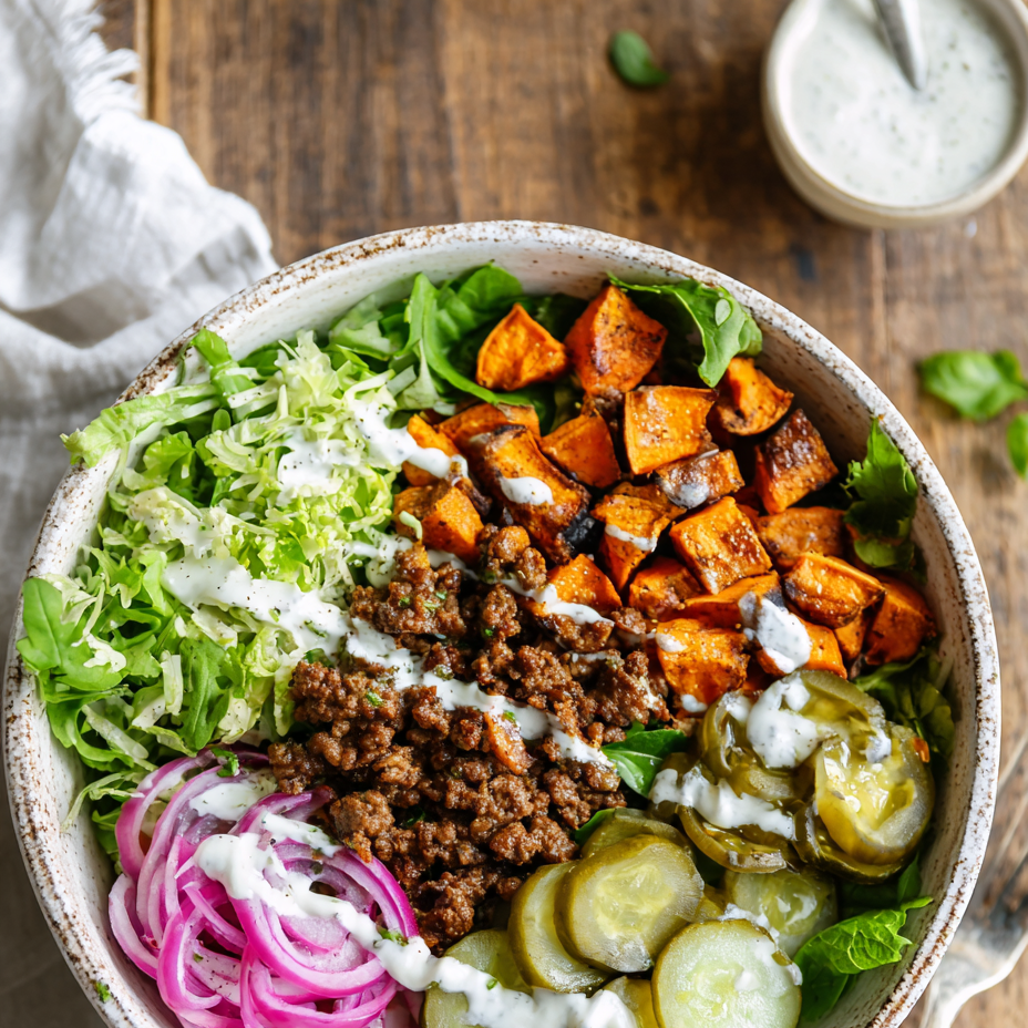 Sweet Potato Burger Bowl with Sauce and Fresh Toppings